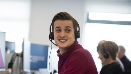 Young man sitting at computer